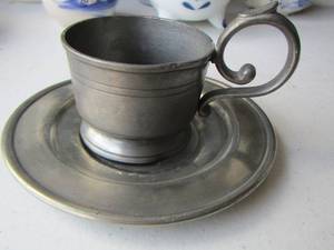 lot 34 image: MID CENTURY ZINN PEWTER Espresso cup & saucer