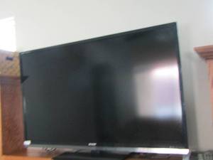 lot 13 image: 65 Sharp flat screen TV with paperwork and remote great working condition