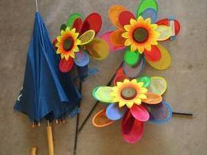 lot 248 image: yard windmills plastic, blue umbrella