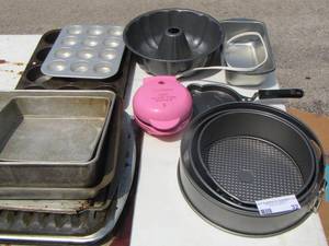 lot 32 image: large lot of baking pans, bread pans, muffin pans, bunt pan, cake pop maker and more