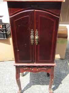 lot 35 image: JEWELRY BOX 5 drawer 2 door has a few scratches 40x16x12