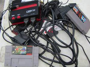 lot 36 image: retro entertainment system - has various plugs - Nintendo games