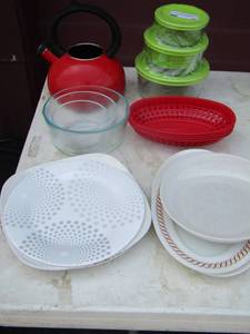 lot 70 image: 3 new kitchen storage bowls with lids, kettle, various plates, 4 red plastic food baskets