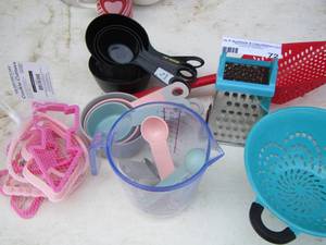 lot 72 image: measuring cup, cheese grader, cookie cutter, strainer