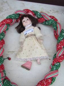 lot 97 image: Christmas braided rope, baby doll