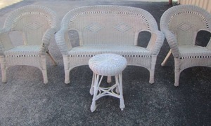 lot 104 image: white wicker patio furniture 1 bench, 2 single chairs, small circle table