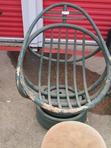 lot 122 image: green wooden egg shape chair with matching added foot stool