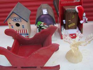 lot 127 image: red wooden Santa sleigh, eagle dcor - 2 wooden bird houses- Santa out house