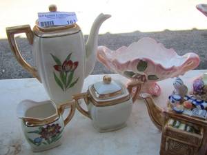 lot 161 image: floral design tea kettle with sugar and creamer, pink floral gravy boat, matching handled pitcher, dresser design tea pot