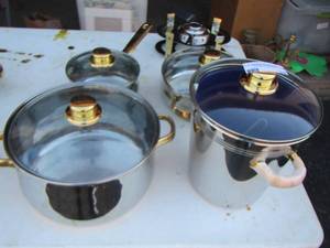 lot 15 image: Command performance gold cuisine cookware 1.5qt sauce pan with lid, 10 covered dish, 11 sauce pan with lid, 8.5 pot with lid, 6 qt pot with lid, ice bucket and a chafing dish burner