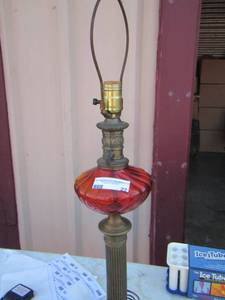 lot 22 image: red globe table lamp