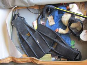 lot 231 image: scuba diving flippers and mask in yellow suitcase