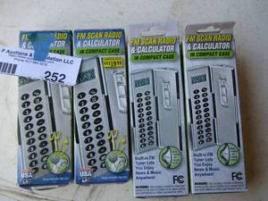 lot 252 image: FM scan radio and calculator in compact case qty 4 all new