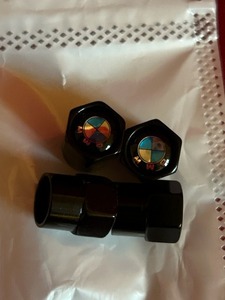 lot 22 image: BMW Valve Stem Caps 3 stiles 6 sets new in package