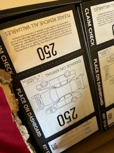 lot 24 image: Box of new valet parking receipts