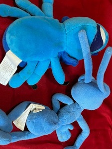 lot 26 image: 2 Disney plush, flick and dim