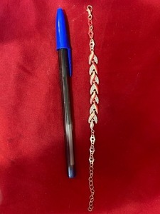 lot 44 image: Pink Metal Metallic Bracelet Pen for size