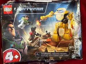 lot 67 image: New in damaged box Lego Lightyears Zyclops #76830