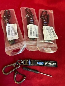 lot 79 image: 4 Ford Leather Keychains