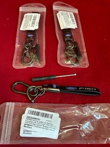 lot 80 image: 4 Ford Leather Keychains