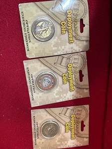 lot 174 image: Three deployment coins, new and package