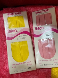 lot 178 image: Pink and yellow vintage sewing lot