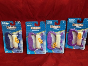lot 198 image: 4 Kite holder up to 300 feet nylon string