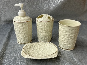 lot 243 image: Four piece ornate bathroom set
