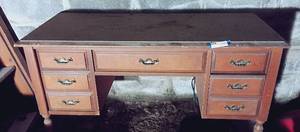 lot 9 image: Solid Wood 7 Drawer Desk