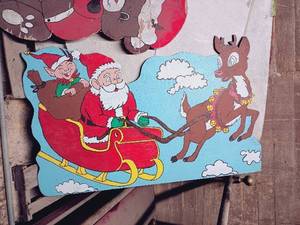 lot 56 image: Large Wooden Hand-Painted Christmas Decor Including Santa and Elf in Sleigh Pulled By Rudolph and Giant Bear w Gift