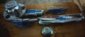 lot 414 image: Vintage Chevy Car Emblems and Parts