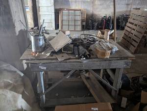 lot 381 image: Desk with Contents Including Screws, Nails, Scrap Metal, and MORE...