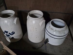 lot 219 image: Large Pottery water jars one with spicket