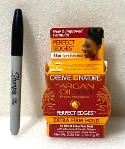 lot 19 image: New Creme Of Nature With Argan Oil Perfect Edges & Extra Firm Hold, 2.25 Oz - As Shown