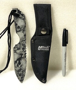 lot 5 image: MTech USA Xtreme Tactical 4400 Stainless Steel Skull Design Knife With Sheath - In Condition As Shown