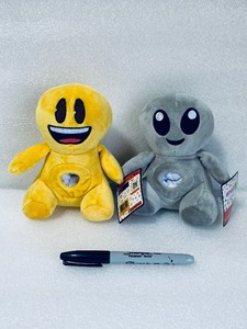 lot 80 image: Lot Of 2 New With Tags - Emoji SenseSational Plushes, Squish, Squeeze & Hug, (1) Alien & (1) Happy - As Shown