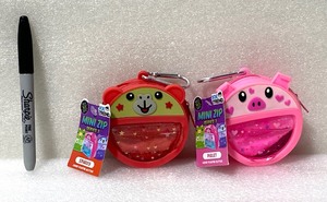 lot 107 image: Lot Of 2 New With Tags - Feel It, Fill It & Clip It Mini Zip With Liquid Floating Glitter, (1) Piglet & (1) Sparky - As Shown