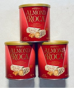 lot 153 image: Lot Of 3 - New Brown & Haley Almond Roca Cannister, The Original Buttercrunch Toffee With Almonds, 10 Oz Per Container - As Shown - Total Retail $45