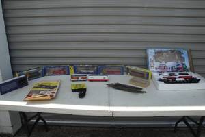lot 119 image: HO Train Lot-Including Caboose and 5 Other Cars, Track, RHM Thunderline Power Pack and Cutouts. Plus 4 Car and Track Deluxe Train Set.