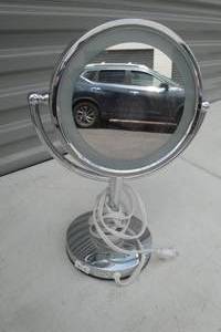 lot 77 image: Lighted Magnified Makeup Mirror, 8in. rd x 15in. High