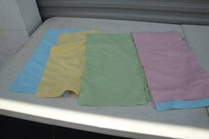 lot 120 image: Lot of 16 Large Cloth Napkins, 8 Pastel and 8 White, About 18in, Square