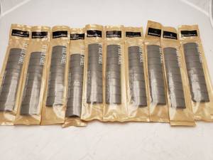 lot 395 image: MAGPUL XT Rail Panel   Dark Earth - QUANTITY 10 - BID IS TIMES THE QUANTITY