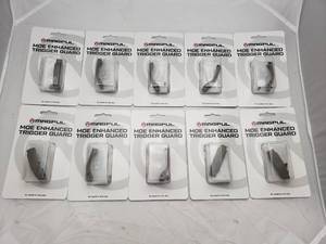 lot 973 image: Magpul Enhanced Trigger Guard, Polymer   AR15M4   Flat Dark Earth - QUANTITY 10 - BID IS TIMES THE QUANTITY