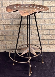 lot 10 image: Texas Star Bar Stool WAntique Tractor Seat
