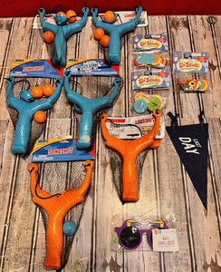 lot 165 image: Lot of Childrens Toys - Including Six Sling Shots, Three Dr. Suess Stem Building Sets, &amp Tucan Sunglasses