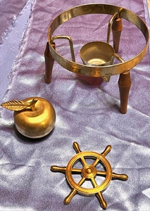 lot 112 image: Vintage Hand-Crafted Brass Apple, Brass and Wood Table Warming Rack, &amp Brass Ships Wheel