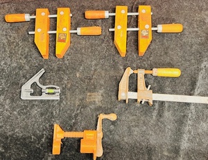 lot 120 image: Four Vintage Wood Clamps - Including Hawk, Craftsman, &amp Pony W Level
