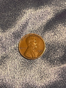 lot 144 image: 1941 S Penny W Rim Rolled L Error