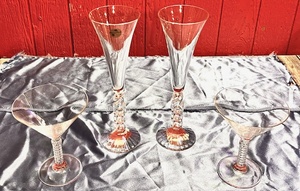 lot 192 image: Baccarat Martini Glasses - Set of Two (2) &amp Set of Two (2) Crystal Champagne Flutes Glasses by Cristal dArques France Millennium