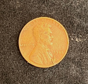 lot 271 image: 1945 Wheat Penny wMajor Obverse Die Breaks, Tilted Rim, &amp No Mint Mark